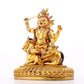 A serene gilt bronze statue of the Heavenly King inlaid with precious stones