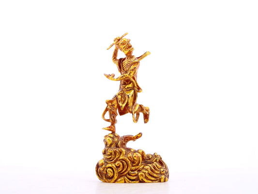 A serene gilt bronze figure