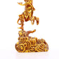 A serene gilt bronze figure