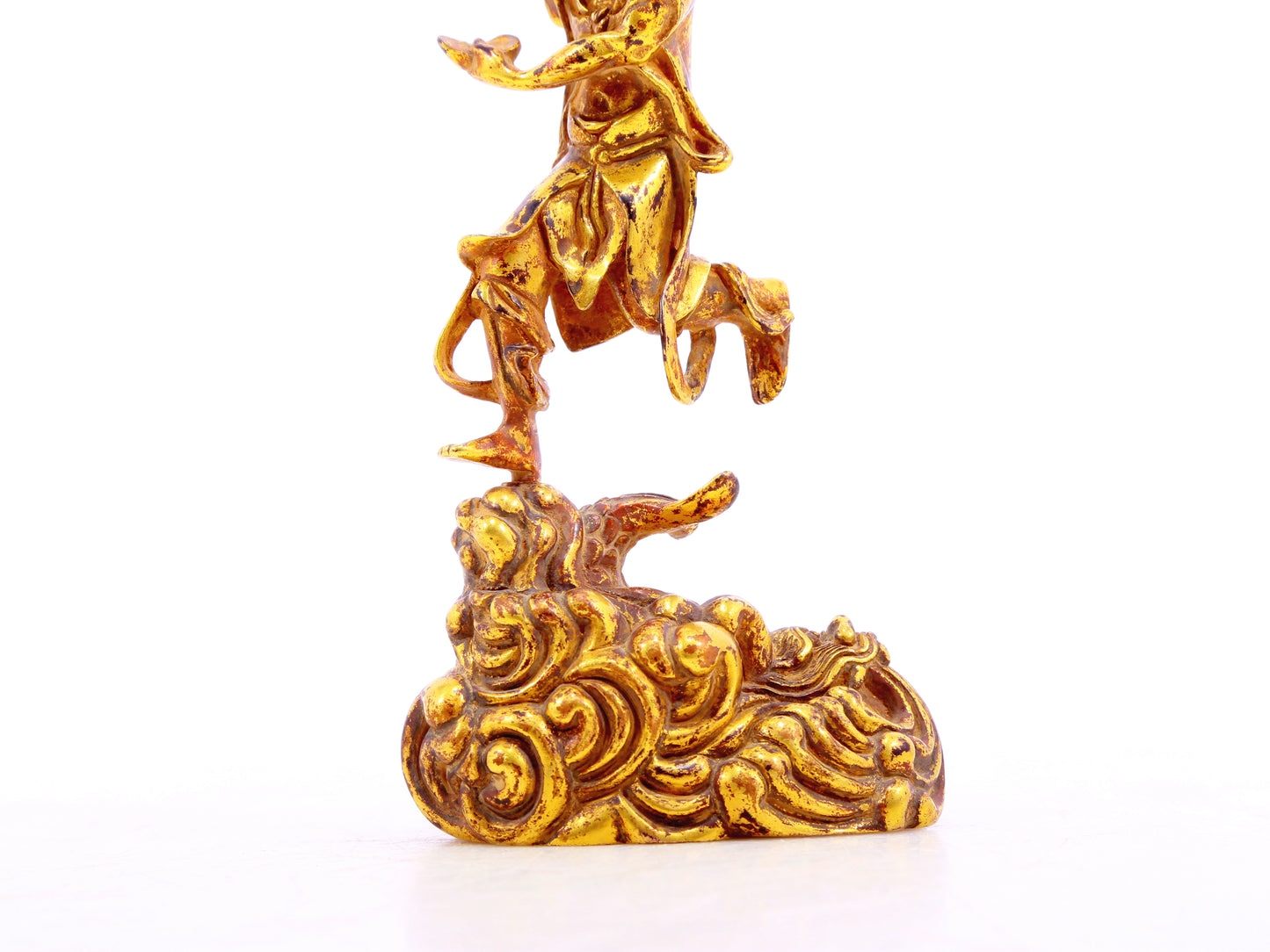 A serene gilt bronze figure