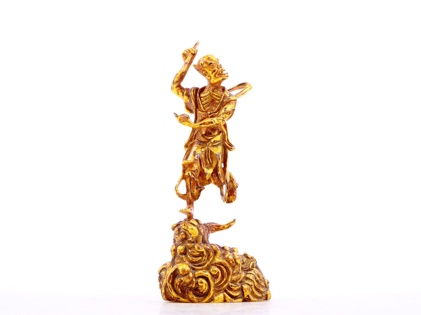 A serene gilt bronze figure