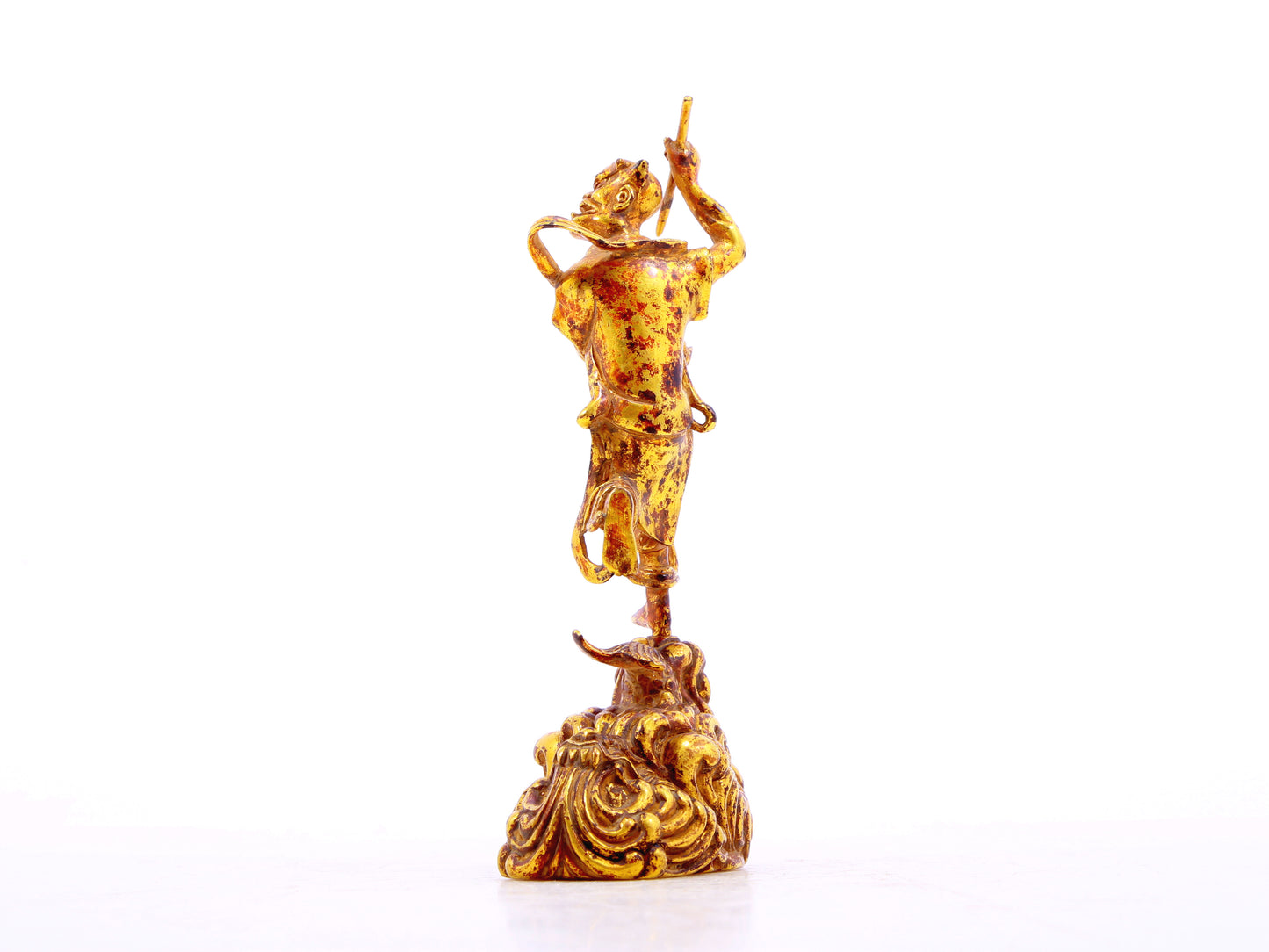 A serene gilt bronze figure