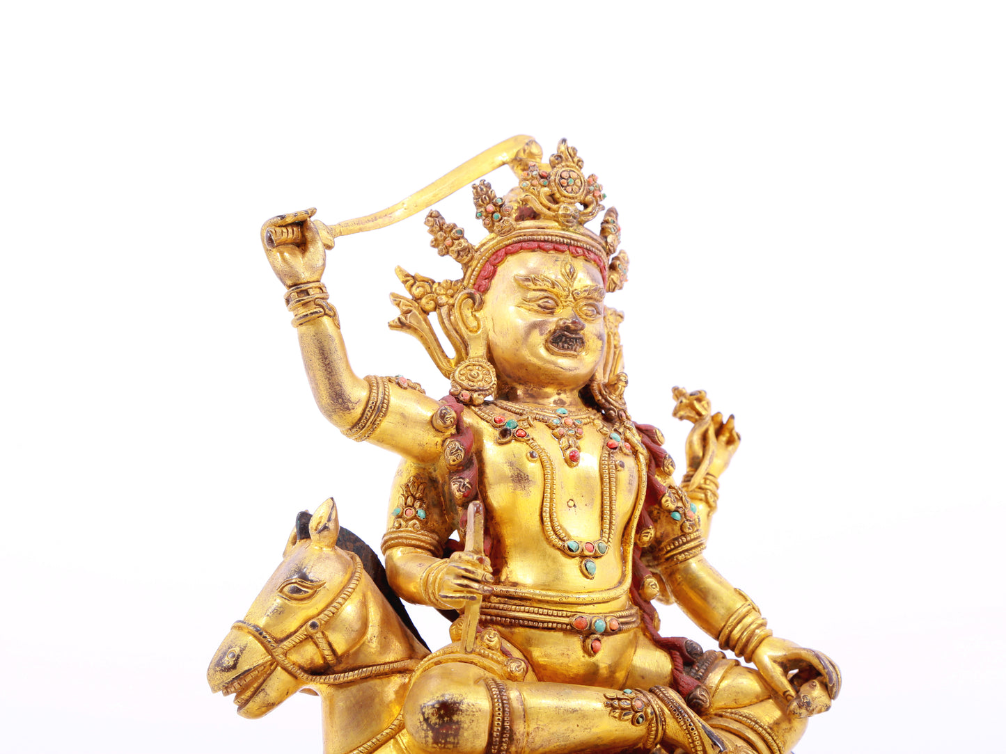 A serene gilt bronze statue of the Heavenly King inlaid with precious stones