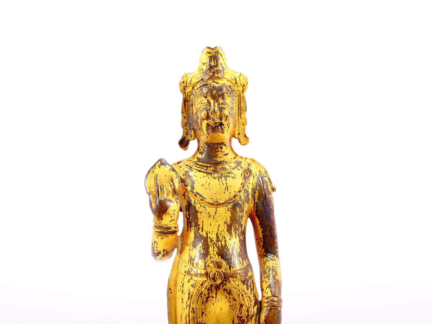 A serene gilt bronze statue of Bodhisattva