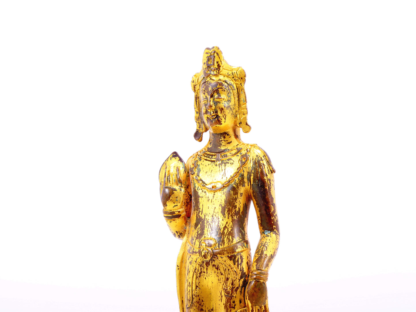 A serene gilt bronze statue of Bodhisattva