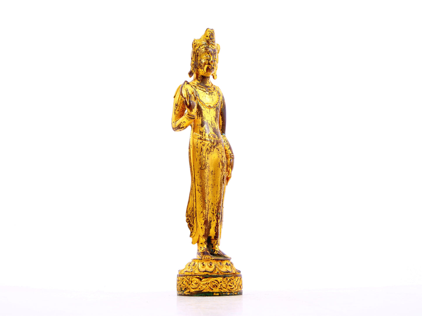 A serene gilt bronze statue of Bodhisattva