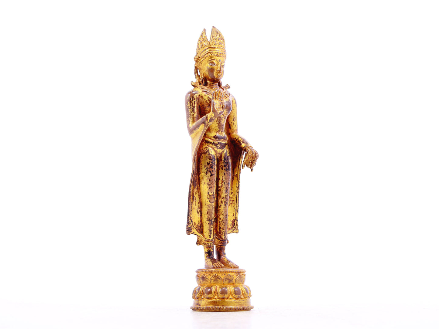 A solemn gilt bronze statue of Tathagata