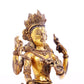 A solemn gilt bronze four-armed Guanyin statue