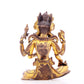 A solemn gilt bronze four-armed Guanyin statue