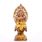 A serene gilt bronze statue of Gautama Buddha