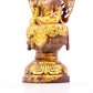 A serene gilt bronze statue of Gautama Buddha