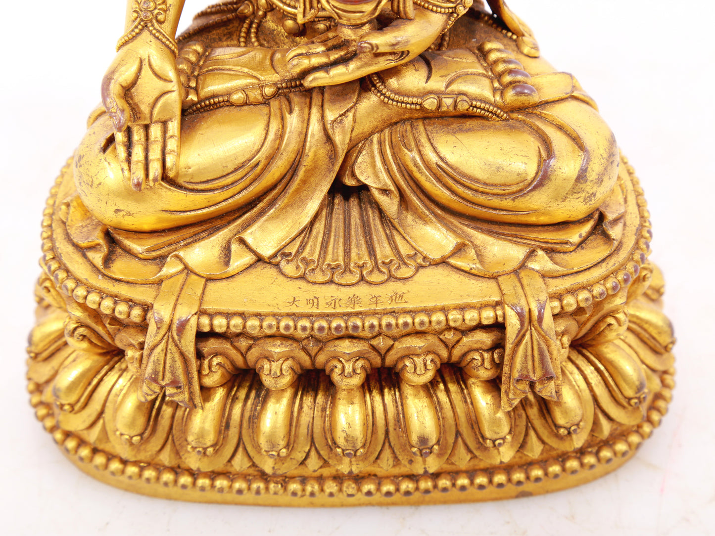 A solemn gilt bronze Bodhisattva statue