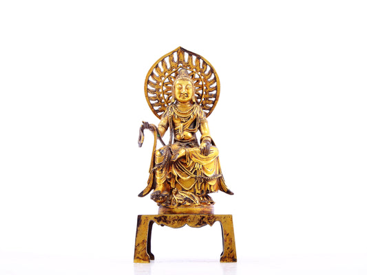 A serene gilt bronze statue of Bodhisattva