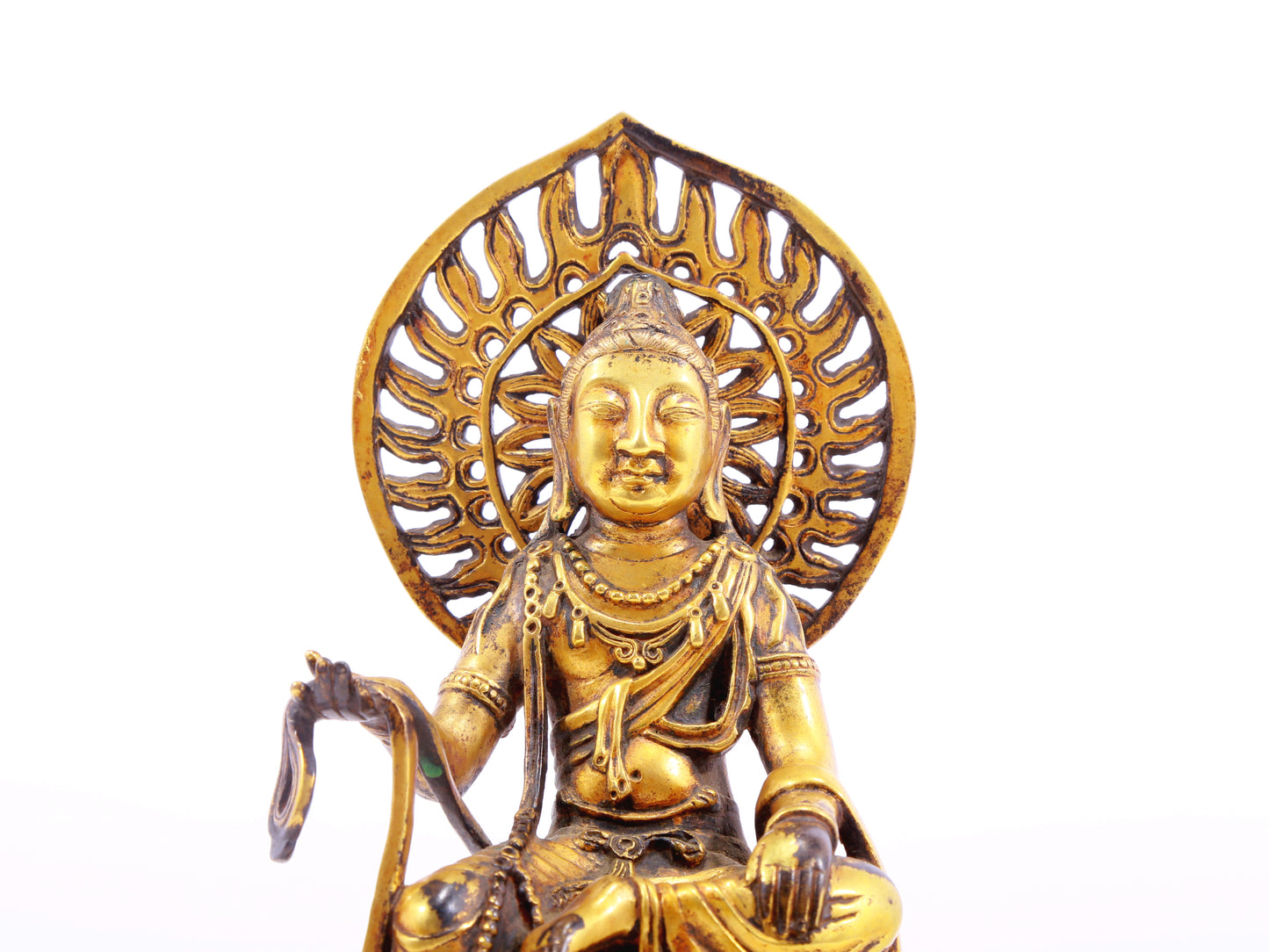 A serene gilt bronze statue of Bodhisattva