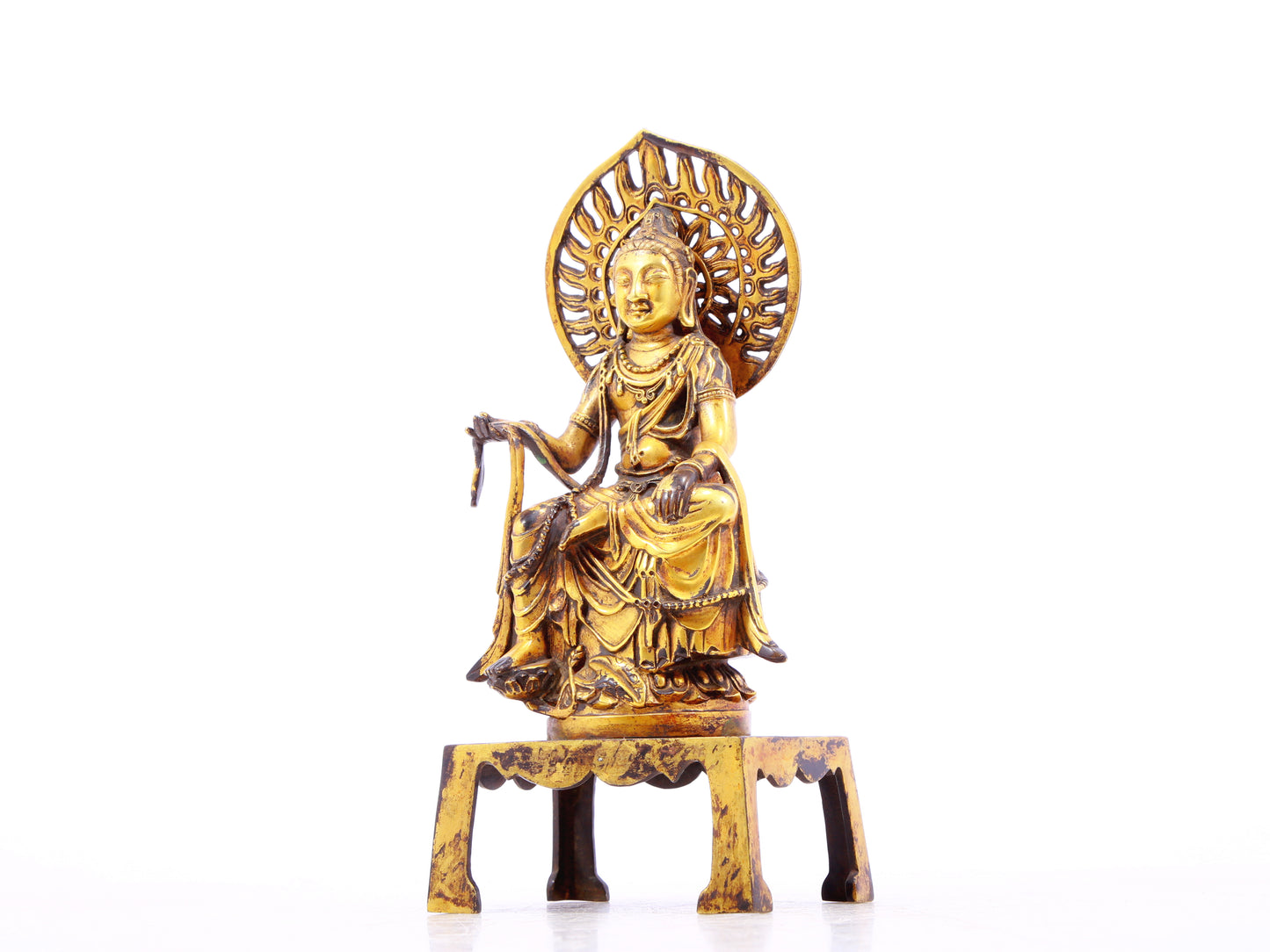 A serene gilt bronze statue of Bodhisattva