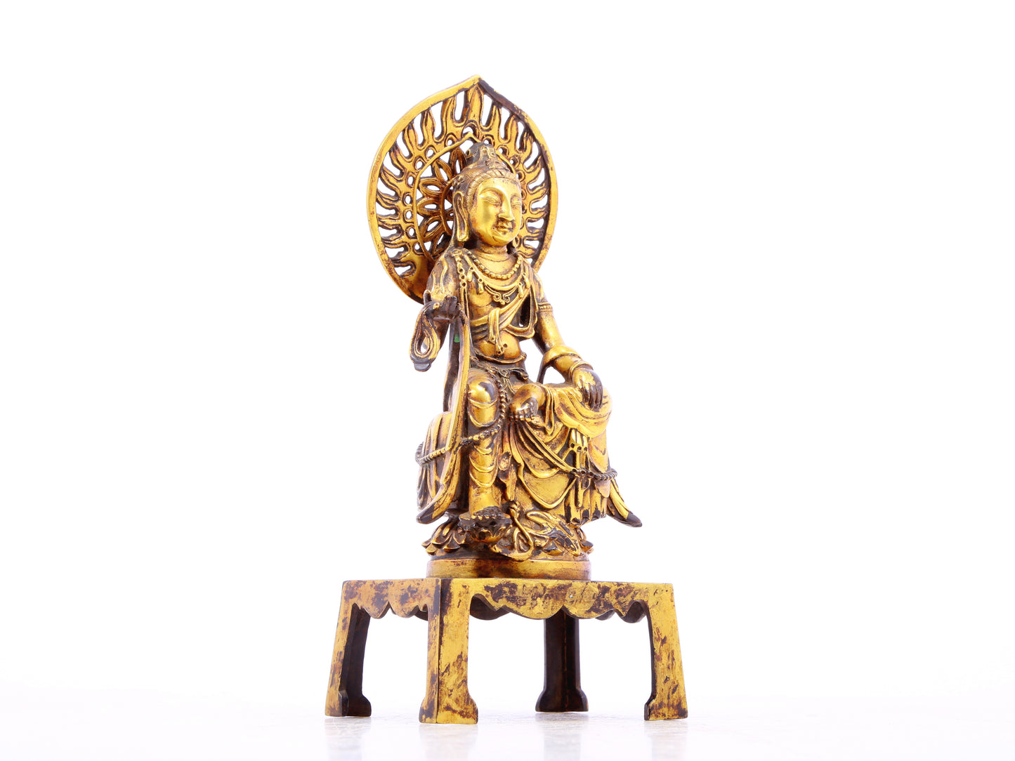 A serene gilt bronze statue of Bodhisattva