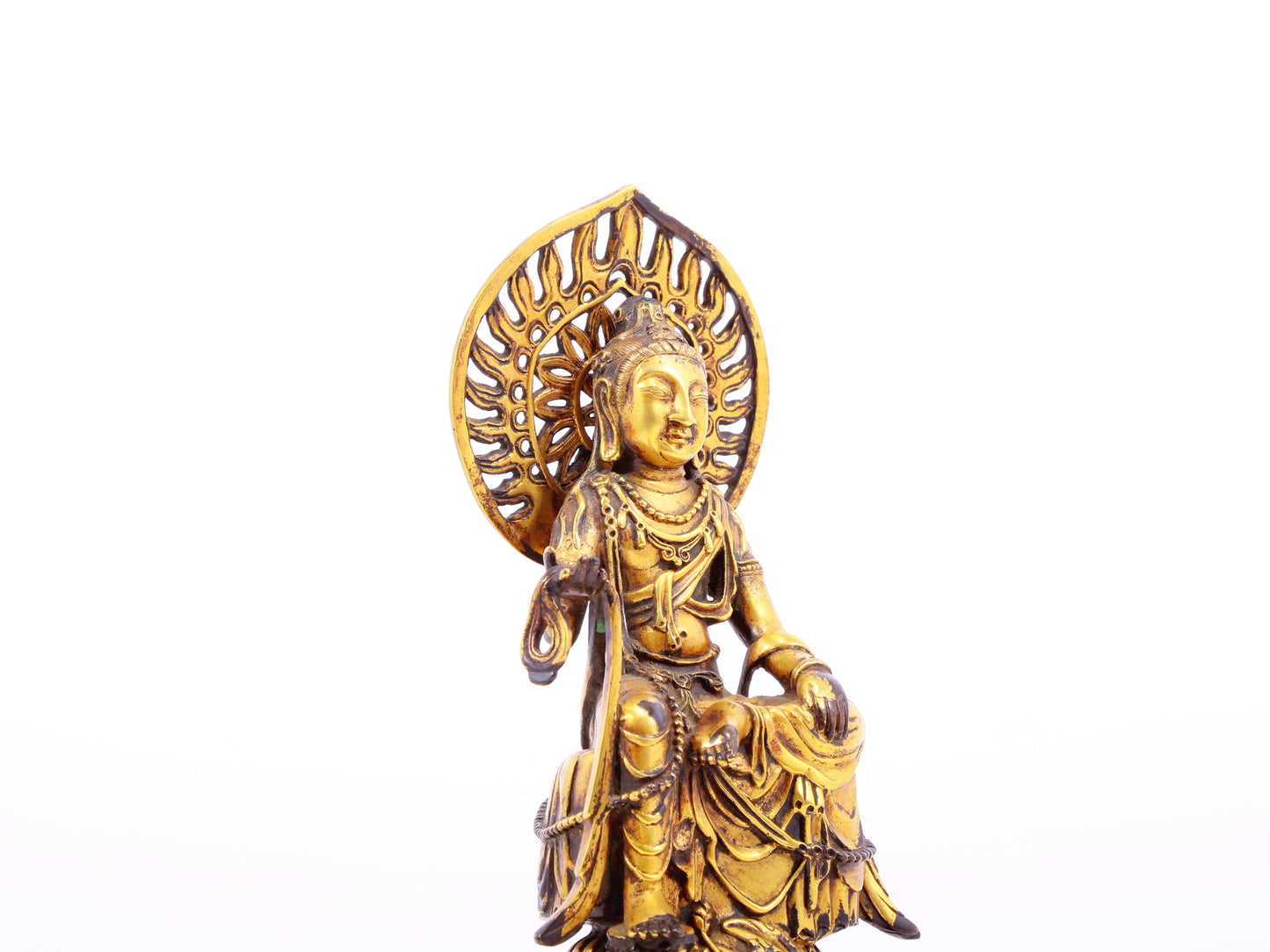 A serene gilt bronze statue of Bodhisattva