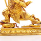 A serene gilt bronze Vajra statue