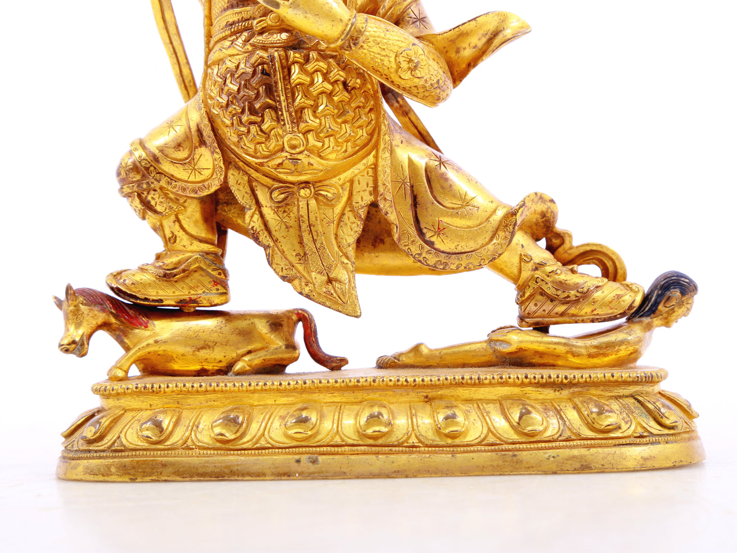 A serene gilt bronze Vajra statue