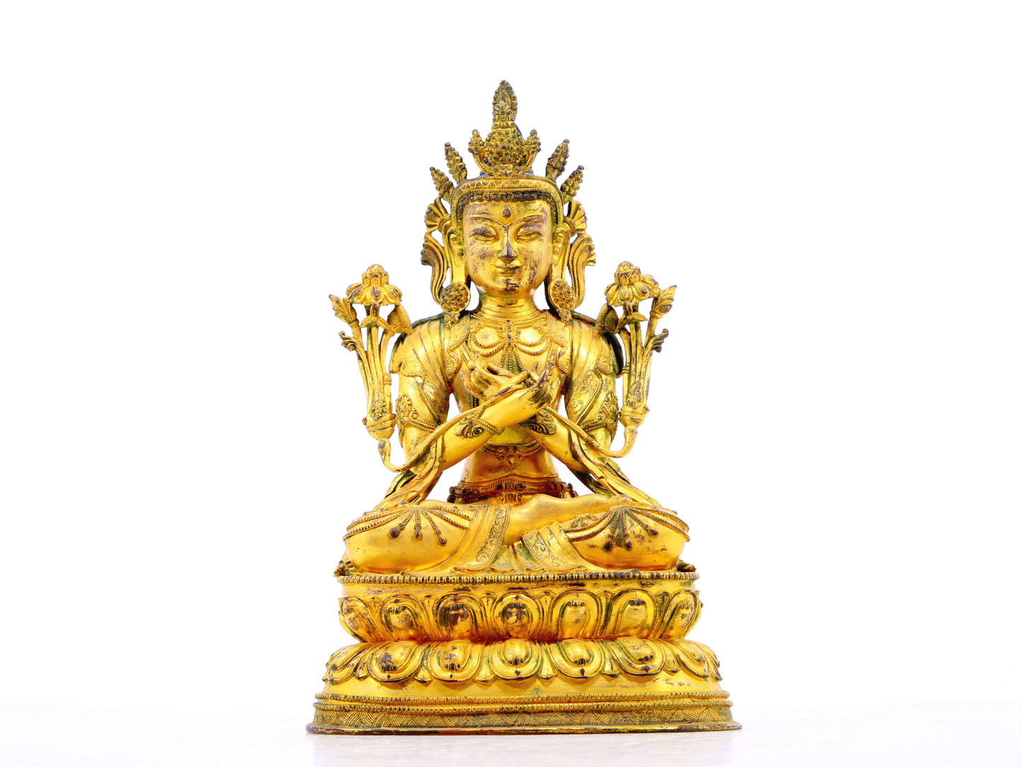 A serene gilt bronze statue of Bodhisattva