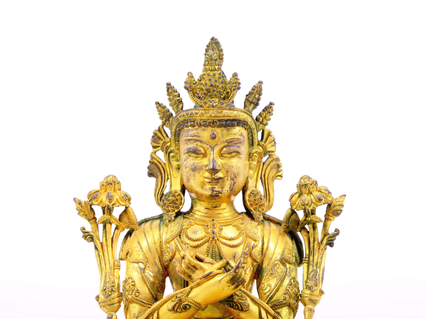 A serene gilt bronze statue of Bodhisattva