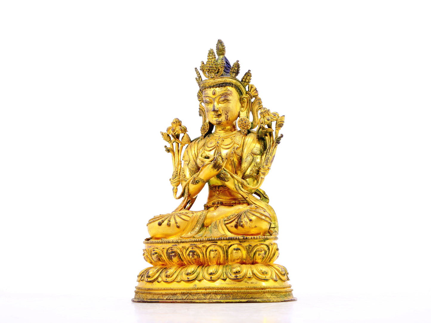 A serene gilt bronze statue of Bodhisattva