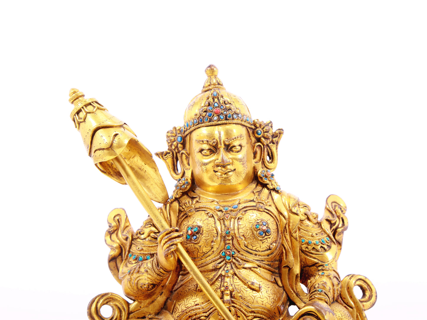 A solemn gilt bronze statue of the Heavenly King inlaid with precious stones