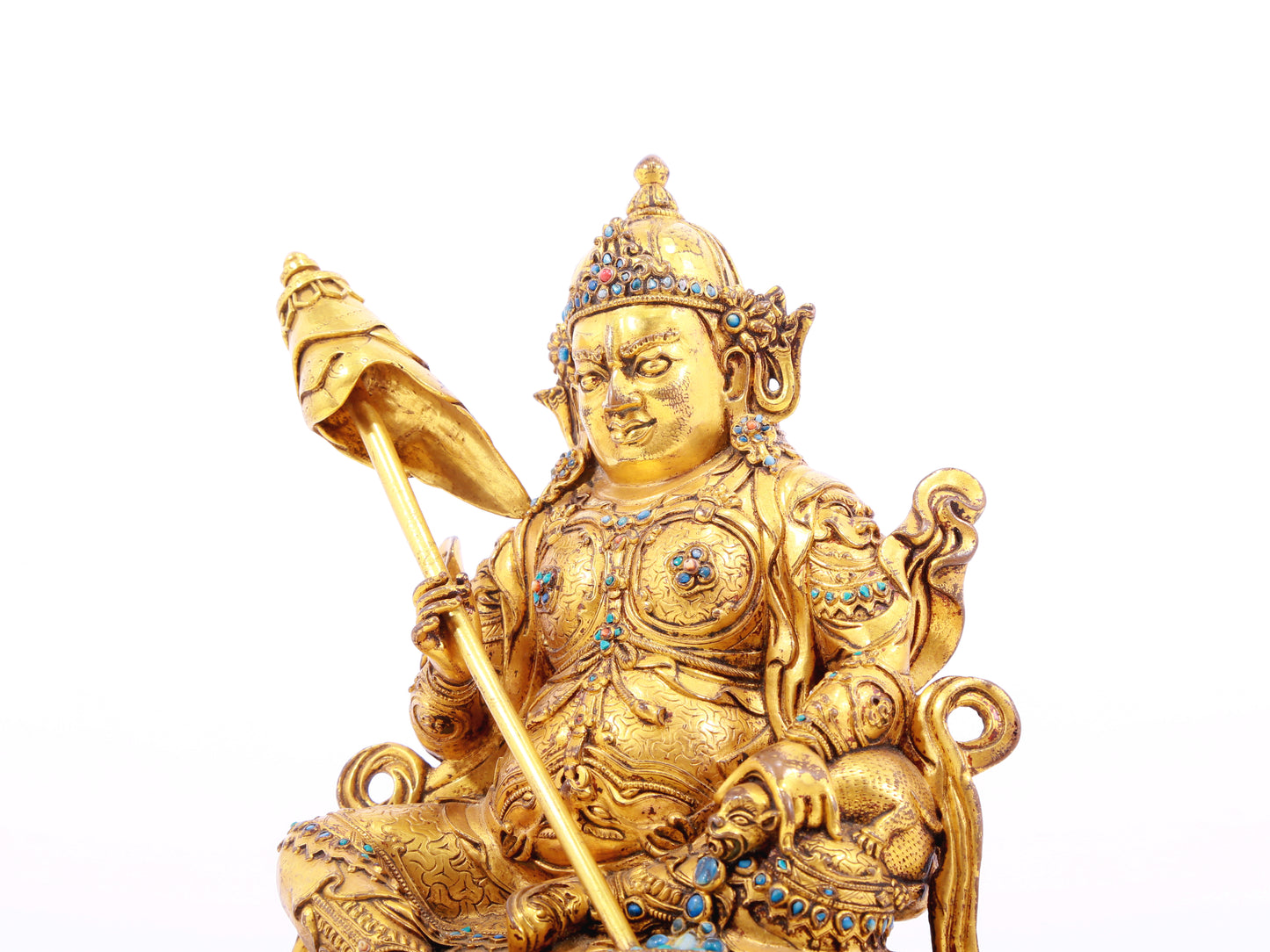 A solemn gilt bronze statue of the Heavenly King inlaid with precious stones