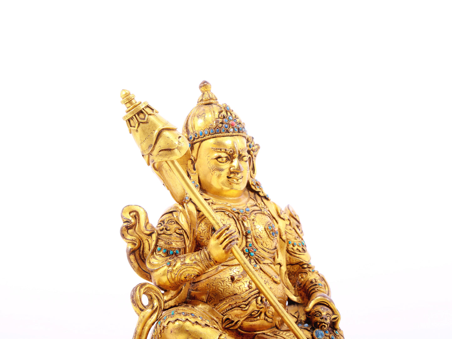 A solemn gilt bronze statue of the Heavenly King inlaid with precious stones