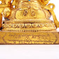 A solemn gilt bronze statue of the Heavenly King inlaid with precious stones