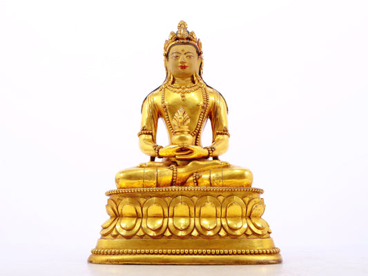 A serene gilt bronze statue of Amitayus Buddha