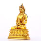 A serene gilt bronze statue of Amitayus Buddha