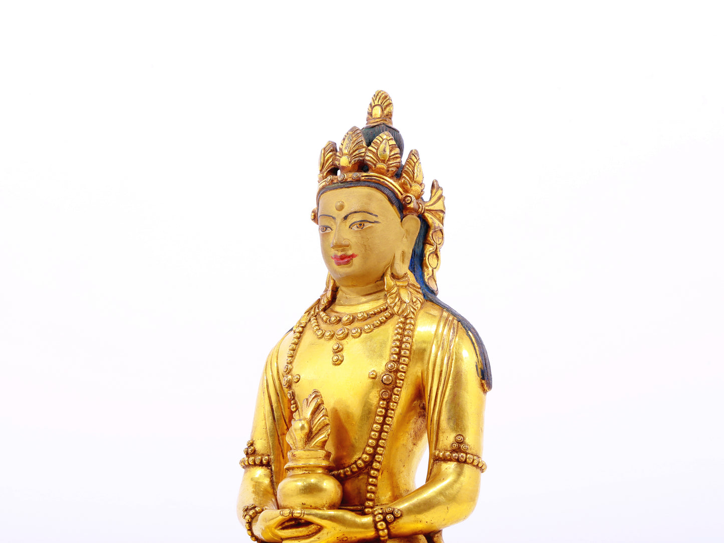 A serene gilt bronze statue of Amitayus Buddha