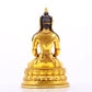 A serene gilt bronze statue of Amitayus Buddha