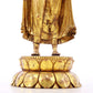 A serene gilt bronze statue of Gautama Buddha