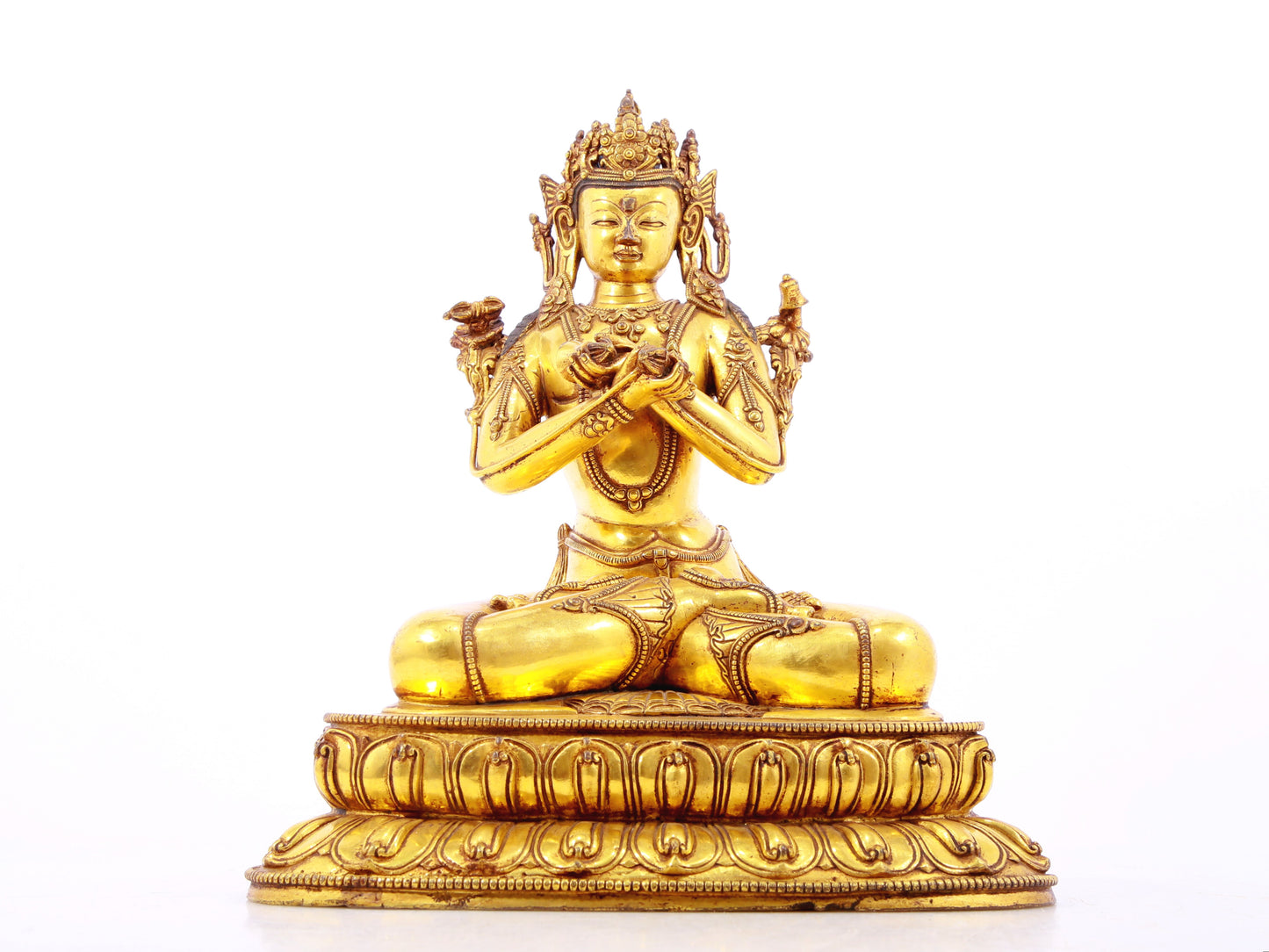 A serene gilt bronze statue of Vajrasattva