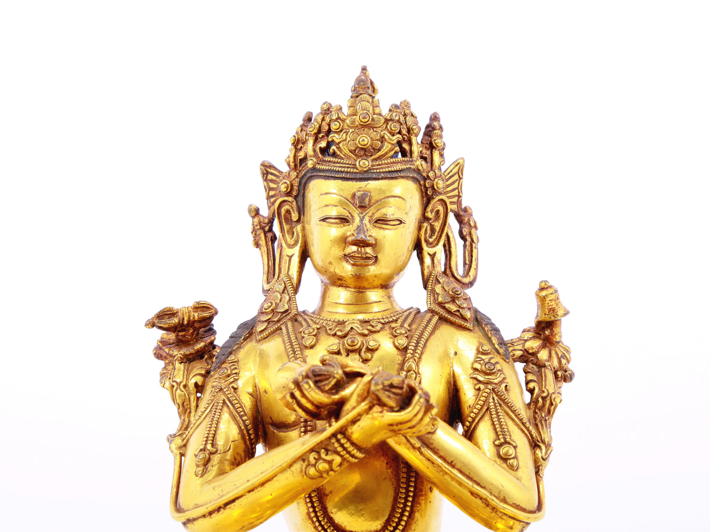 A serene gilt bronze statue of Vajrasattva