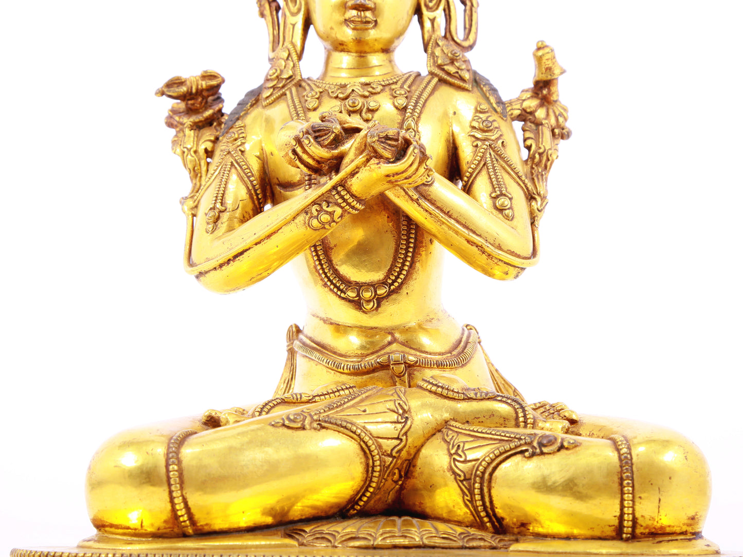 A serene gilt bronze statue of Vajrasattva