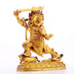 A serene gilt bronze Vajra statue