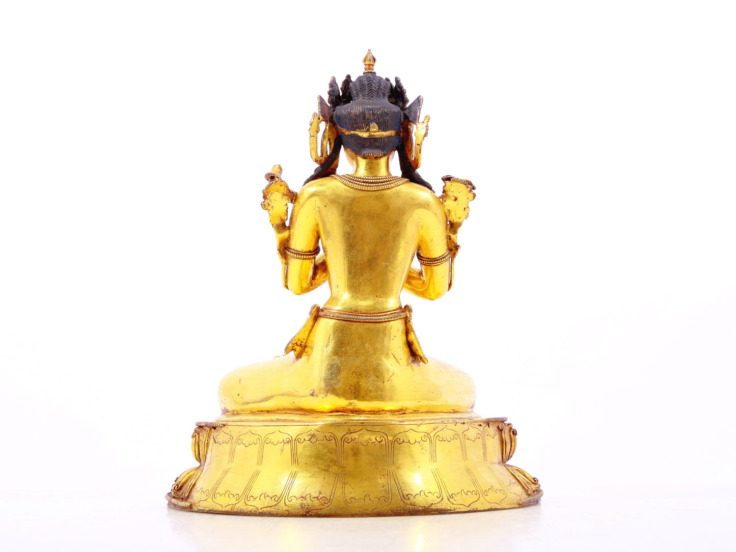 A serene gilt bronze statue of Vajrasattva