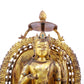 A solemn gilt bronze statue of green Tara