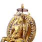 A solemn gilt bronze statue of green Tara