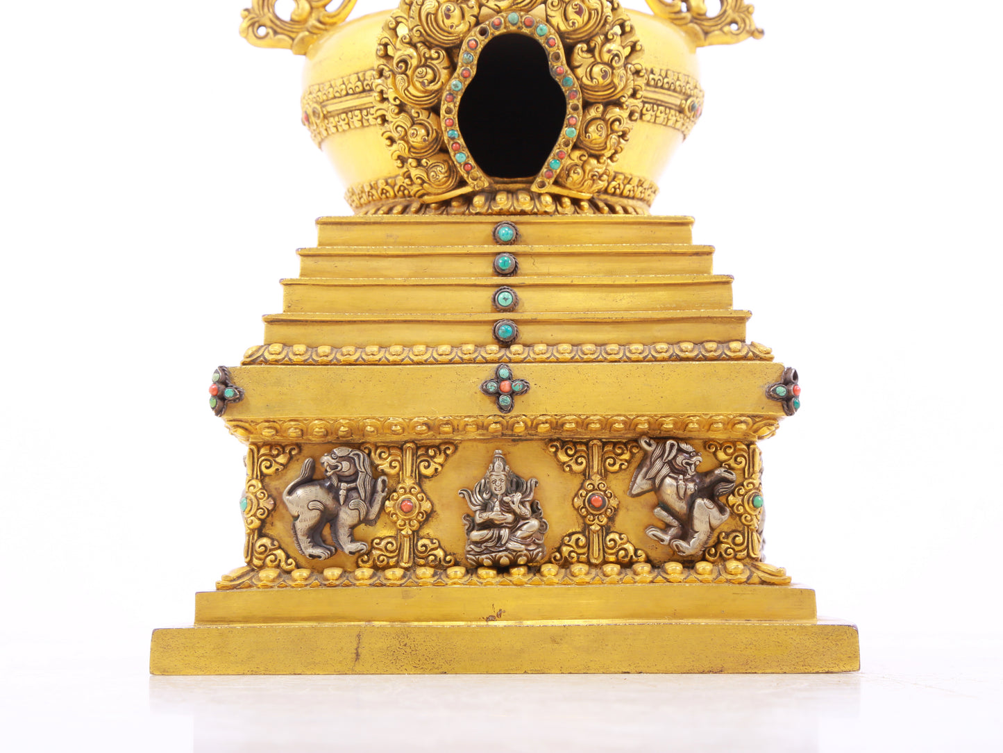 An exquisite gilt bronze and silver Buddhist altar with inlaid gems