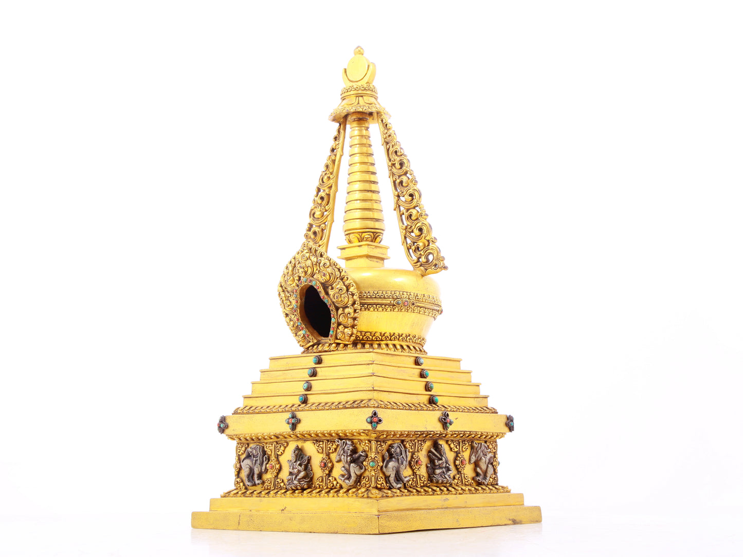 An exquisite gilt bronze and silver Buddhist altar with inlaid gems