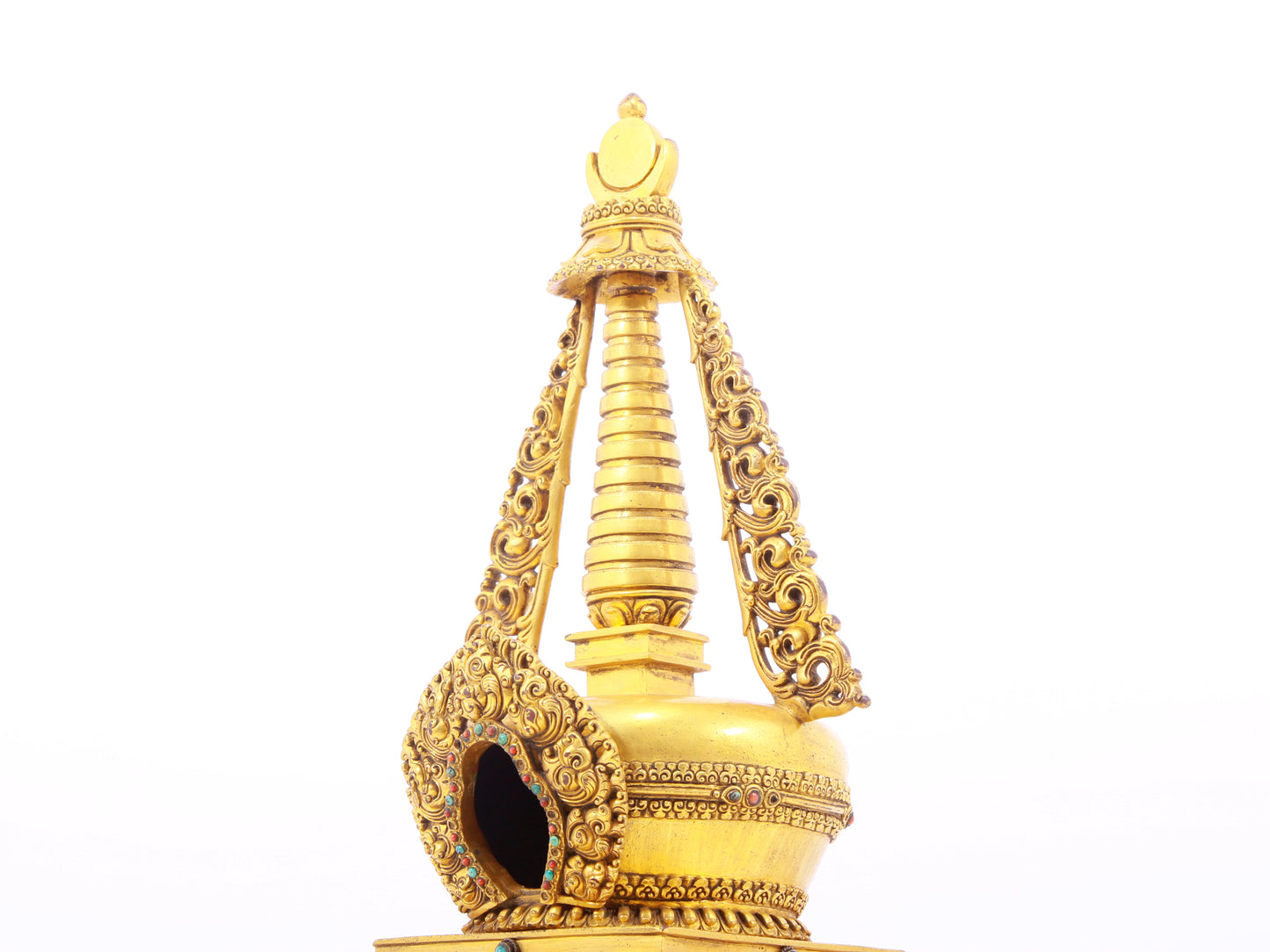 An exquisite gilt bronze and silver Buddhist altar with inlaid gems