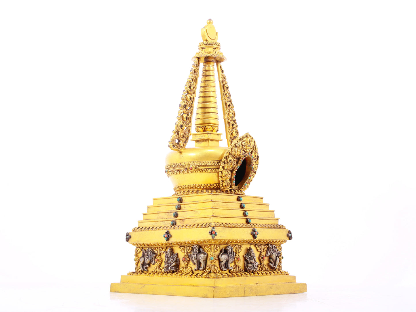 An exquisite gilt bronze and silver Buddhist altar with inlaid gems