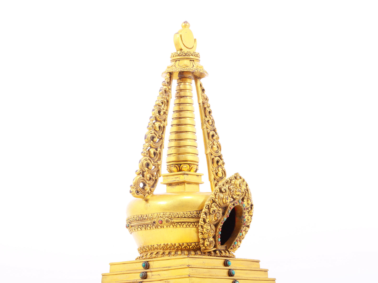 An exquisite gilt bronze and silver Buddhist altar with inlaid gems