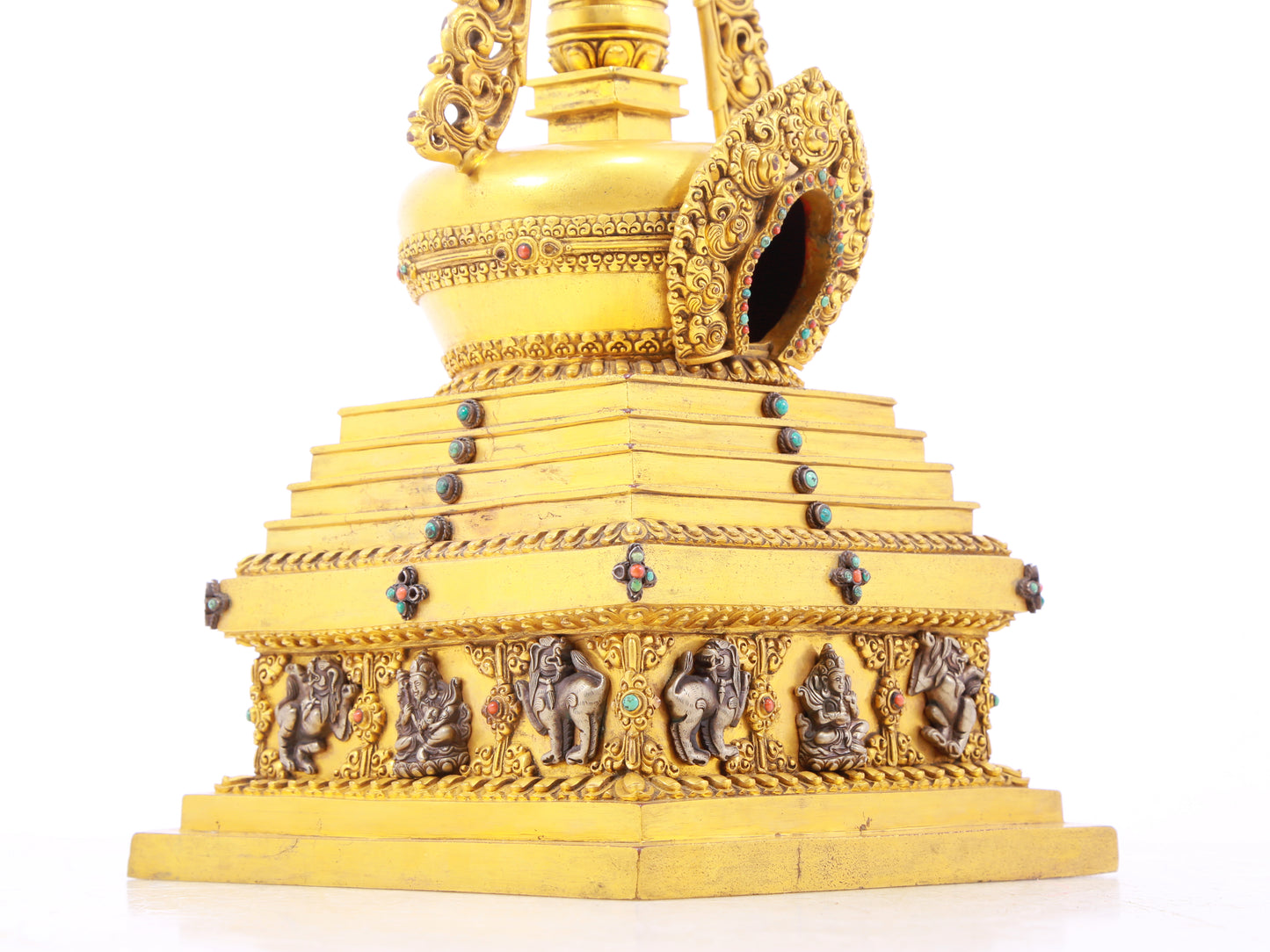 An exquisite gilt bronze and silver Buddhist altar with inlaid gems