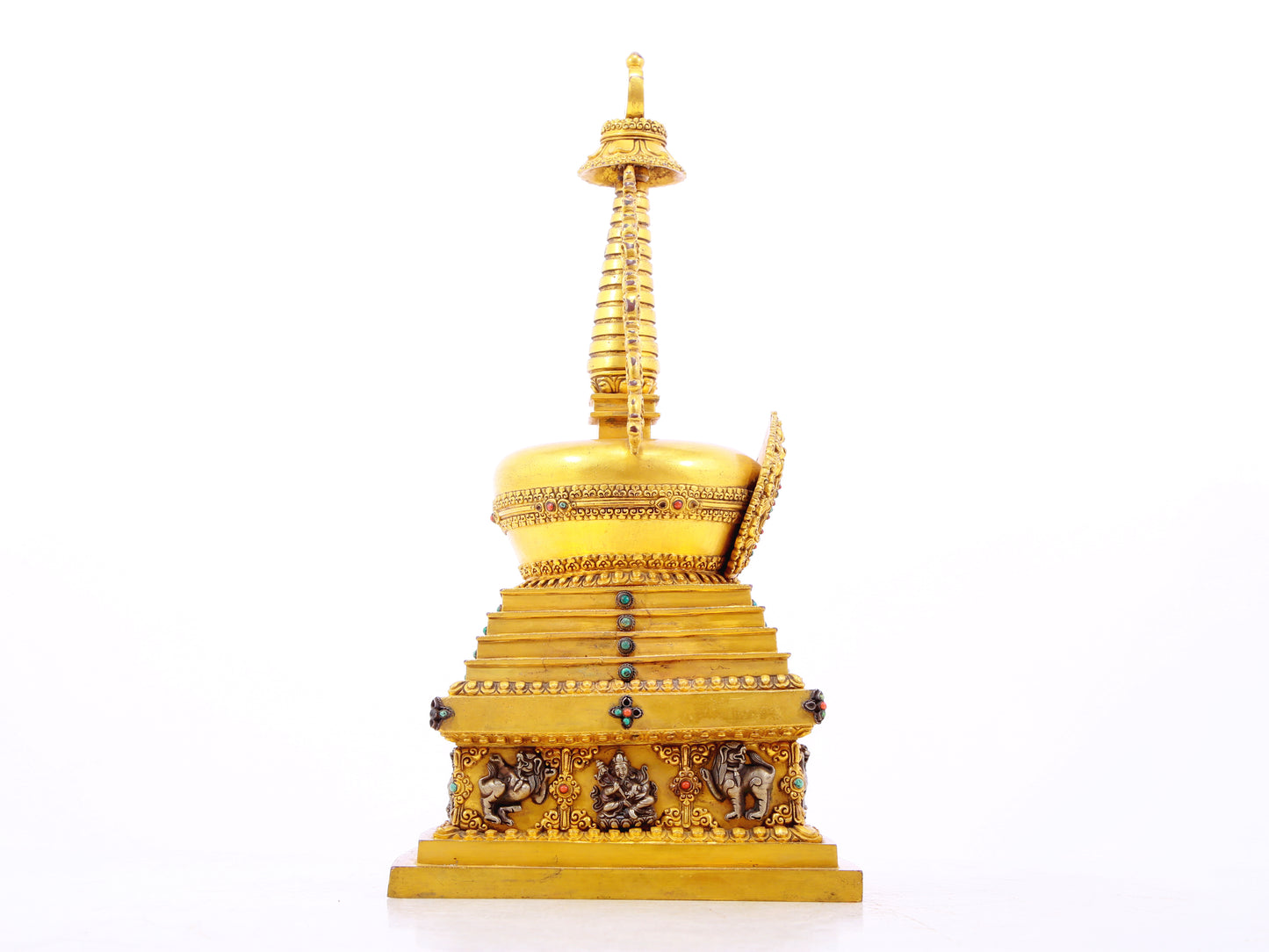 An exquisite gilt bronze and silver Buddhist altar with inlaid gems