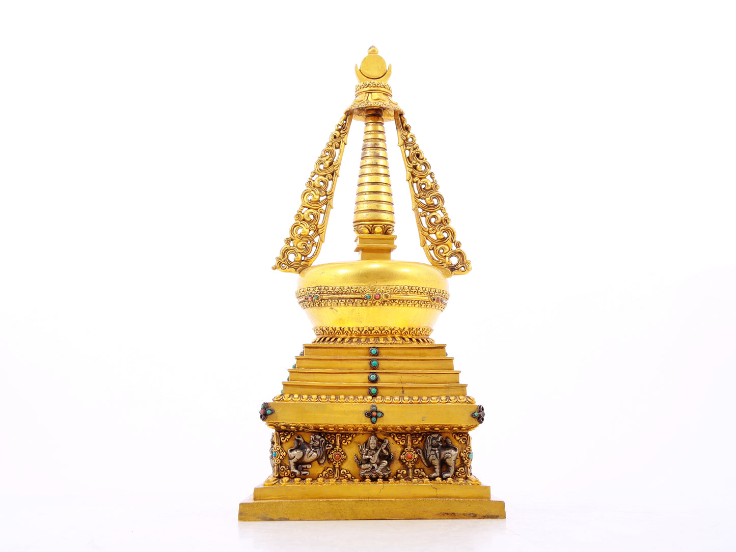 An exquisite gilt bronze and silver Buddhist altar with inlaid gems